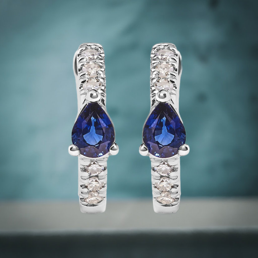 10K White Gold Pear Shaped Blue Sapphire and 1/10 Cttw Diamond Huggy Hoop Earrings (H-I Color, I1-I2 Clarity)